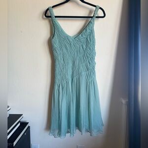 Emporio armani spring 22 runway. Blue flowy vneck silk dress